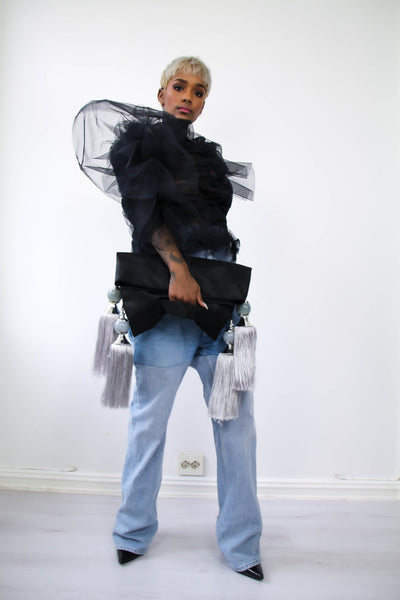 Shop Emerging Contemporary Womenswear brand Too Damn Expensive Tassel Clutch Bag at Erebus