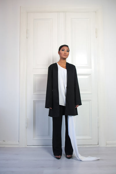 Shop Emerging Contemporary Urban Conscious Womenswear Brand Too Damn Expensive White Asymmetric Sleeve Top at Erebus