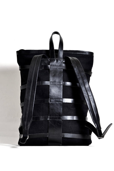 Shop emerging dark conscious fashion accessory brand Anoir by Amal Kiran Jana Black Leather and Organic Cotton Canvas Skeleton Backpack at Erebus