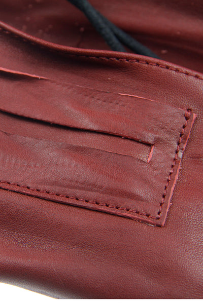 Shop Emerging Slow Fashion Avant-garde Artisan Leather Brand Gegenüber Red Leather Bifold Tobacco Wallet at Erebus