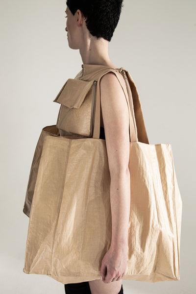 Shop Emerging Conceptual Dark Fashion Womenswear Brand DZHUS Transit Collection Beige Container Transformable Dress / Bag / Waistcoat / Backpack at Erebus
