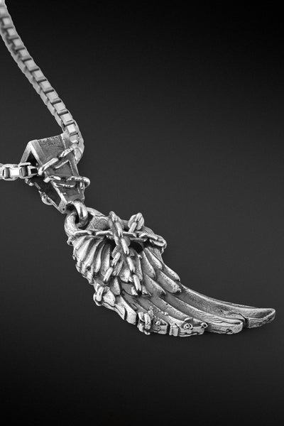 Shop Artisan Jewellery Brand Helios Sterling Silver Freedom Chained Wing Pendant at Erebus