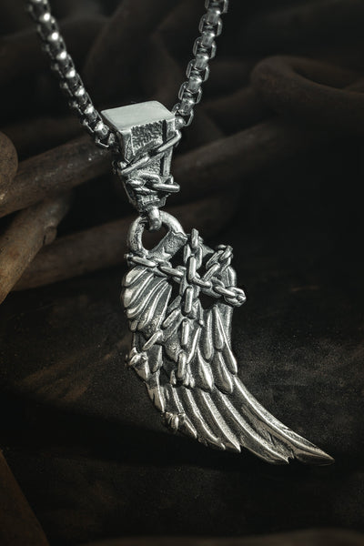 Shop Artisan Jewellery Brand Helios Sterling Silver Freedom Chained Wing Pendant at Erebus