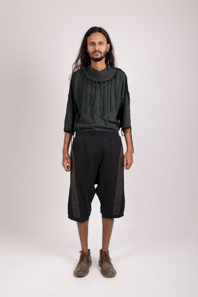 Shop emerging dark alternative conscious fashion genderless brand Anoir by Amal Kiran Jana Black Organic Cotton with Reclaimed Leather Detail Loki Shorts at Erebus