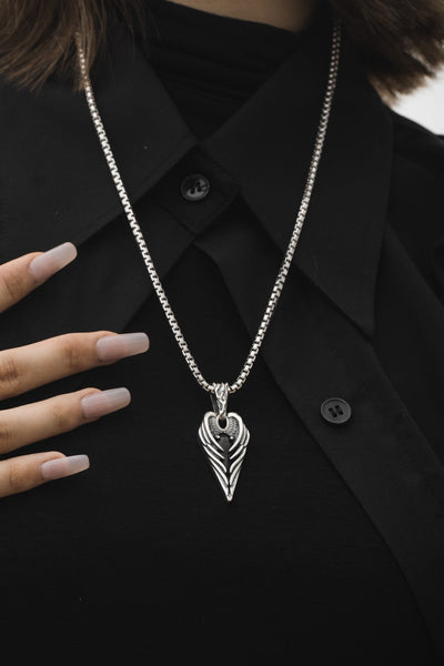 Shop Artisan Jewellery Brand Helios Sterling Silver and Onyx Stone Patient Wing Pendant at Erebus