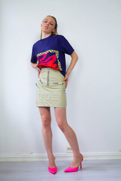 Shop Emerging Contemporary Womenswear brand Too Damn Expensive Beige Sheepskin Leather High-Waist Skirt with TDE Logo at Erebus