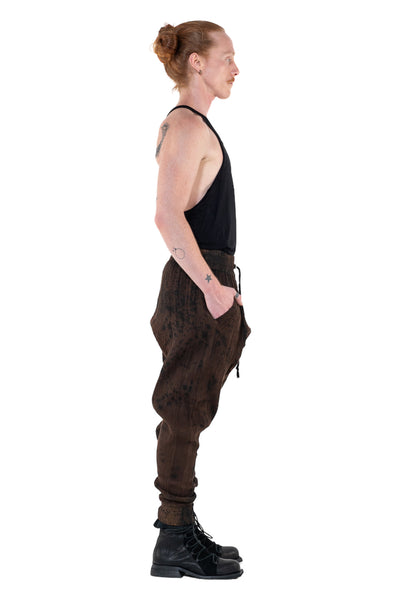 Shop Emerging Slow Fashion Genderless Alternative Avant-garde Designer Mark Baigent Annex Collection Fair Trade Signature Noda Brown Batik Cotton Terry Aal Low Crotch Jogging Pants at Erebus