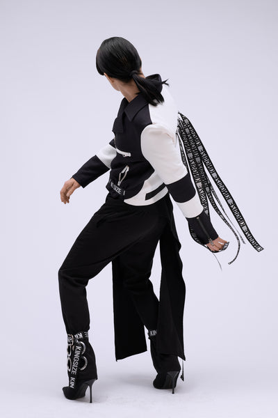 Shop Emerging Contemporary Conscious Womenswear Brand Too Damn Expensive Black Ring Pants with Detachable Belt at Erebus
