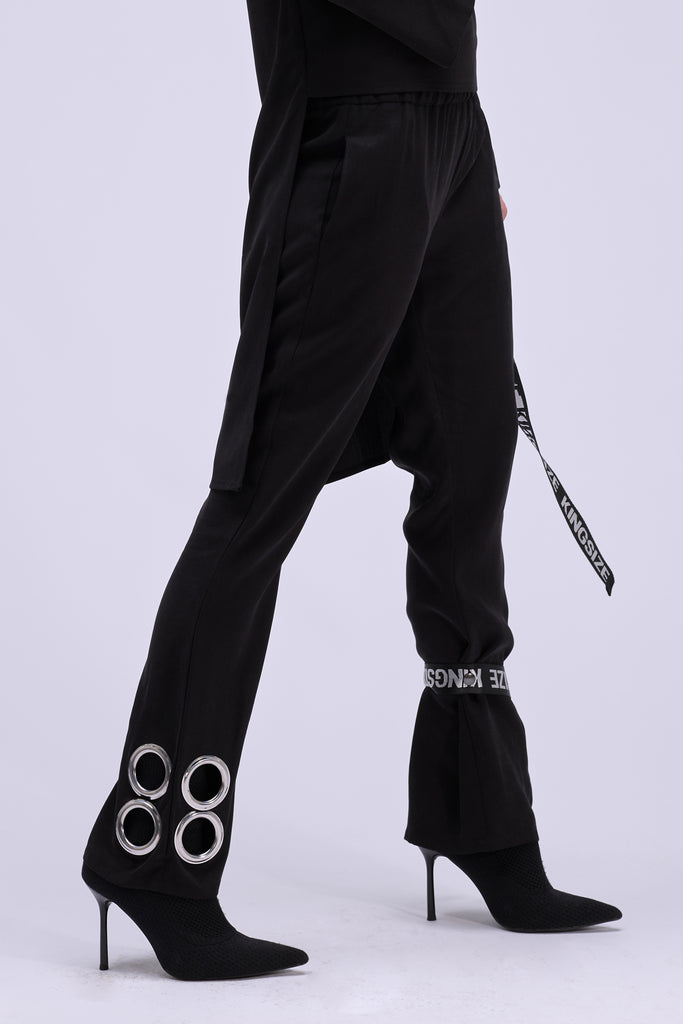 Shop Emerging Contemporary Conscious Womenswear Brand Too Damn Expensive Black Ring Pants with Detachable Belt at Erebus