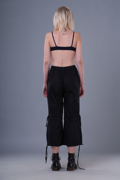 Shop Emerging Dark Conceptual Brand Anagenesis Braille Black Cropped Stand Trousers at Erebus