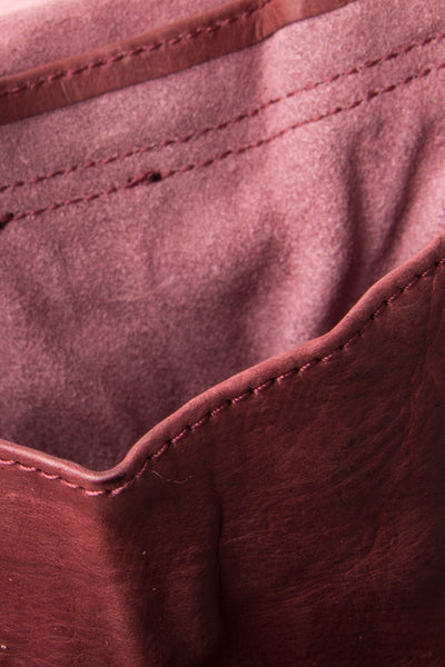 Shop Emerging Slow Fashion Avant-garde Artisan Leather Brand Gegenüber Red Mond Half Moon Bag at Erebus