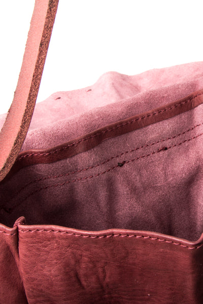 Shop Emerging Slow Fashion Avant-garde Artisan Leather Brand Gegenüber Red Mond Half Moon Bag at Erebus