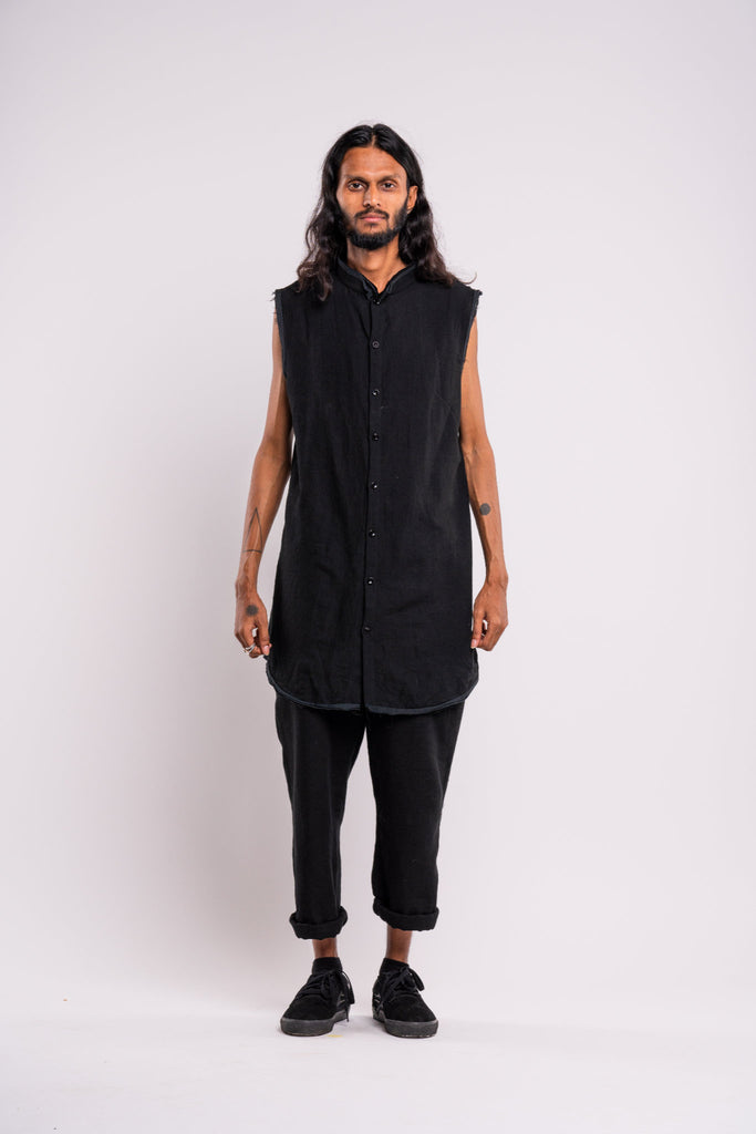 Shop emerging dark conscious fashion genderless brand Anoir by Amal Kiran Jana Black Raw Sleeveless Shirt at Erebus