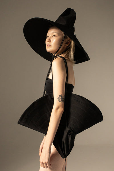 Shop Emerging Conceptual Dark Fashion Womenswear Brand DZHUS Physique SS22 Collection Black Pose Transformable Hat / Sleeve / Bag at Erebus