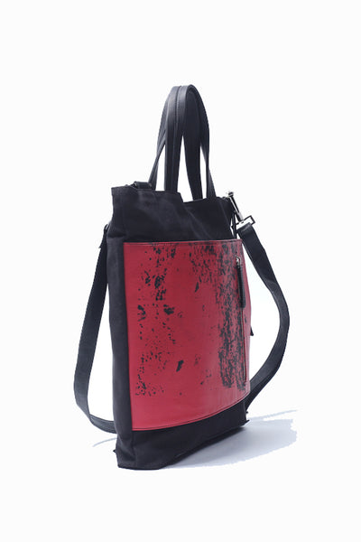 Shop emerging slow fashion handbag designer Anoir by Amal Kiran Jana black cotton canvas and red leather Transformable Tote - Erebus