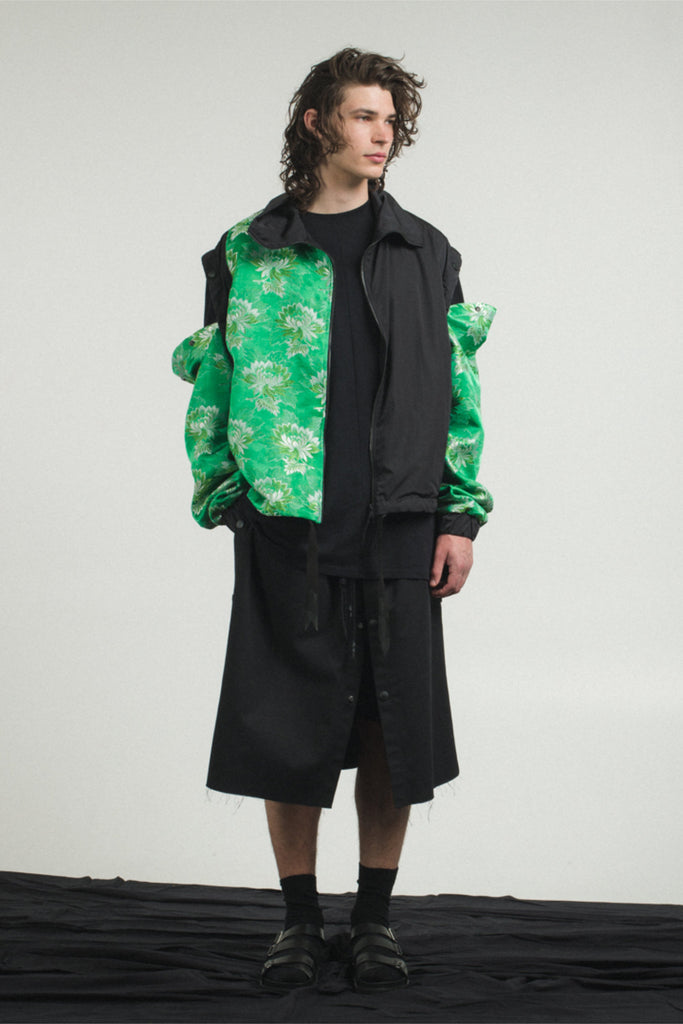 Shop Conscious Contemporary Menswear Brand Zsigmond Kudus SS23 Collection Black Recycled Polyester and Poison Green Up-cycled Vintage Fabric Kasso Coat at Erebus