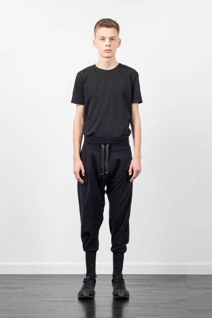 Shop Emerging Alternative Fashion Unisex Street Brand Monochrome AW22 Black Folded Jogging Pants at Erebus