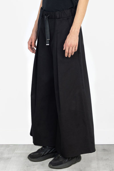 Shop Emerging Alternative Fashion Unisex Street Brand Monochrome AW22 Black Denim Hakama Trousers at Erebus