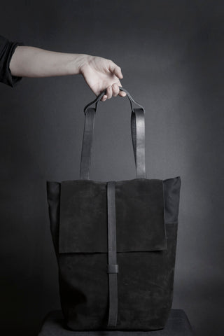 Shop Emerging Conscious Avant-garde Designer Brand MDK Miranda Kaloudis Black Suede and Waxed Cotton Canvas Transformable Tesris Flap Backpack Bag at Erebus