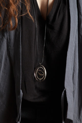 Shop Emerging Conscious Avant-garde Designer Brand MDK Miranda Kaloudis Spinning Sphaira Pendant Necklace at Erebus