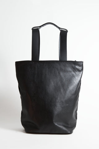 Shop Emerging Conscious Avant-garde Designer Brand MDK Miranda Kaloudis Black Nappa Leather and Waxed Cotton Canvas Transformable Tesris Backpack Bag at Erebus
