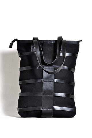 Shop emerging dark conscious fashion accessory brand Anoir by Amal Kiran Jana Black Leather and Organic Cotton Canvas Skeleton Tote Bag at Erebus