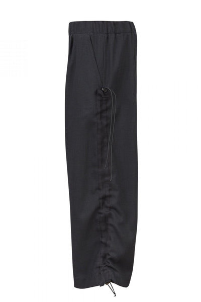 Shop Emerging Unisex Street Brand Monochrome Black Organic Linen Tape Trousers at Erebus