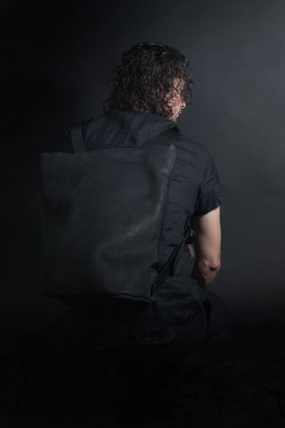 Shop Emerging Conscious Avant-garde Designer Brand MDK Miranda Kaloudis Black Nubuck Leather and Waxed Cotton Canvas Transformable Tesris Backpack Bag at Erebus