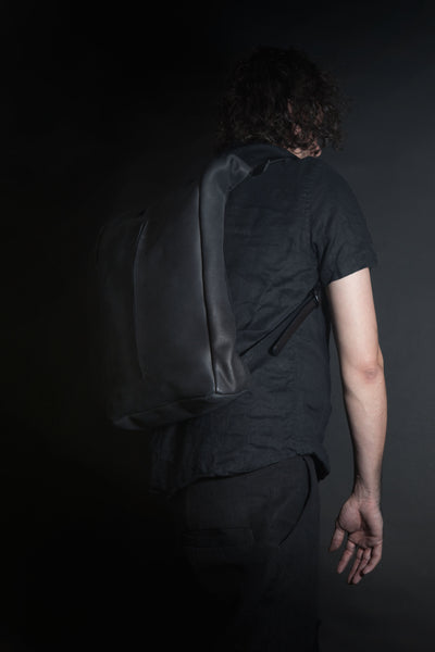 Shop Emerging Conscious Avant-garde Designer Brand MDK Miranda Kaloudis Faded Black Nubuck and Waxed Cotton Canvas Transformable Tesris Tall Backpack Bag at Erebus